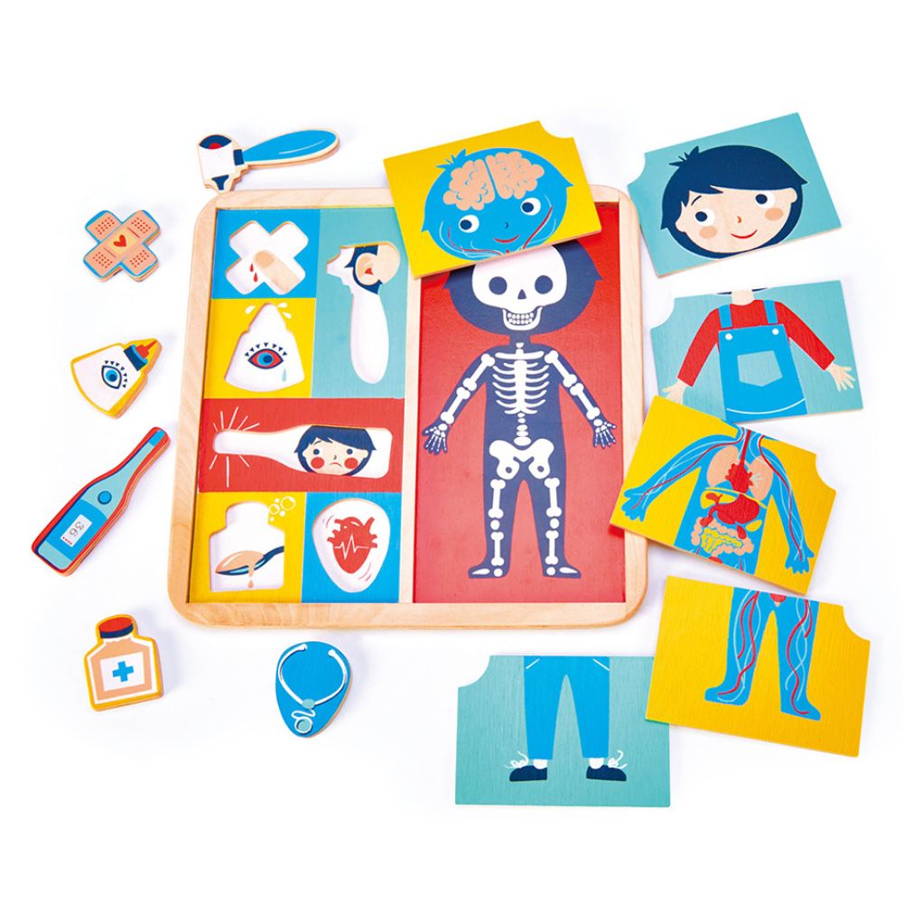 12 brikker fra træpuslespil fra Tender Leaf - Hvor gør det ondt?